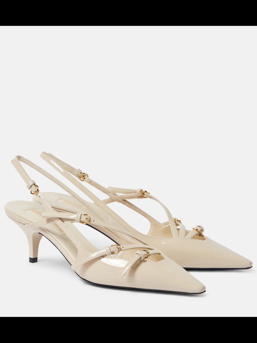 Miu Miu

Patent leather slingback pumps